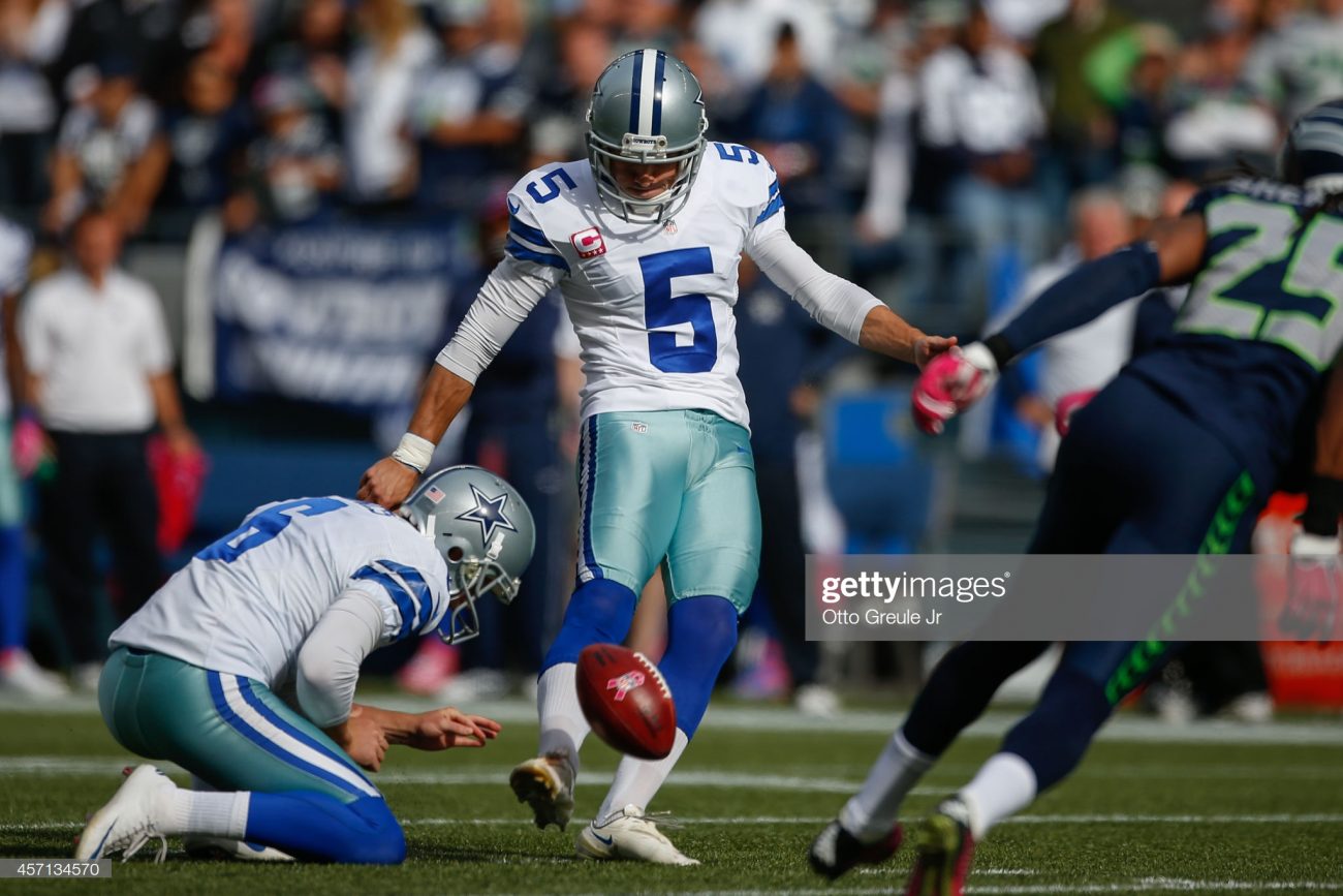 SEATTLE, WA - OCTOBER 12:  Dan Bailey #5 of the Dallas Cowboys kicks a field goal to tie the score at 10-10 in the second quarter against the Seattle Seahawks at CenturyLink Field on October 12, 2014 in Seattle, Washington. The Cowboys defeated the Seahawks 30-23.  (Photo by Otto Greule Jr/Getty Images)